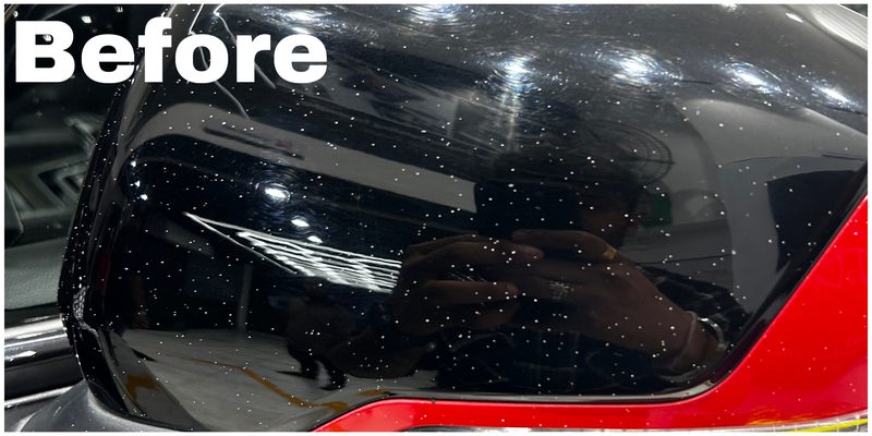 Before complete car detailing — water-spotted rear quarter glass