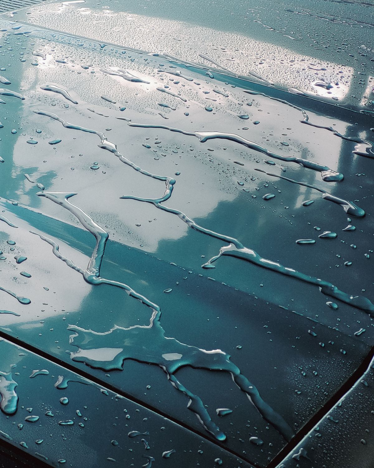Water beading on a graphene-coated car panel