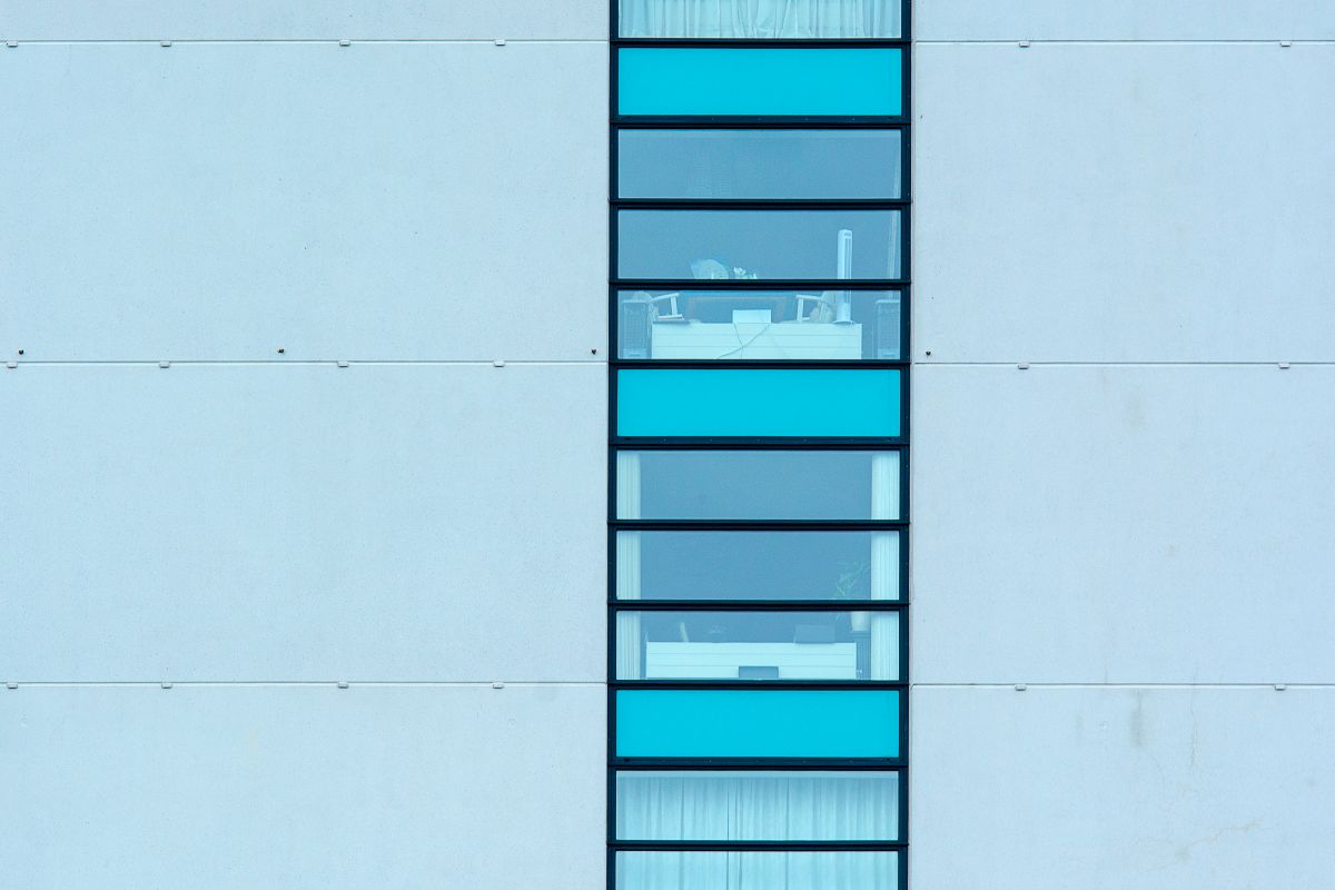 After film installation — home window with visible tinted film reducing glare