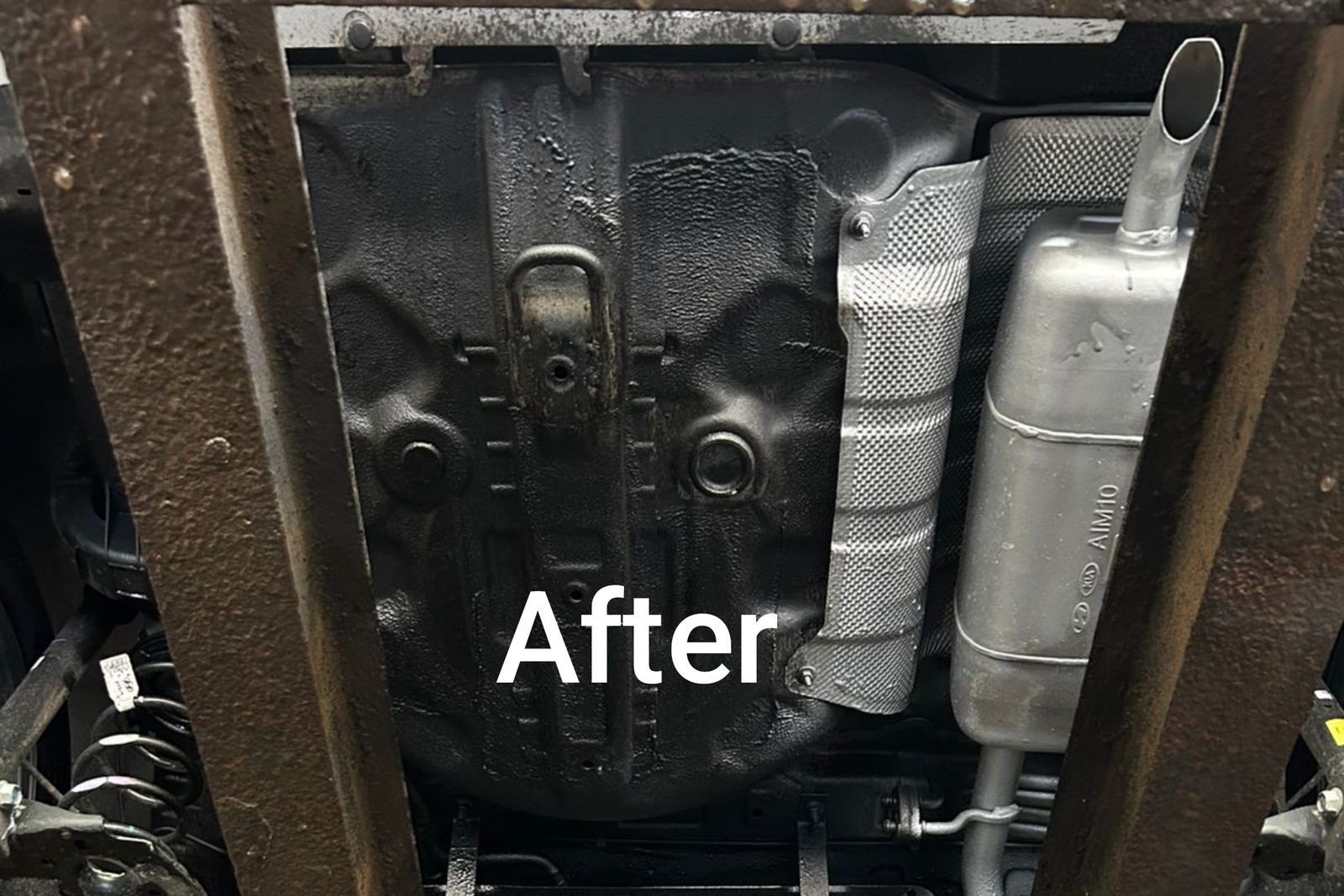 Freshly coated underbody chassis and exhaust after 3M underbody coating in Thane